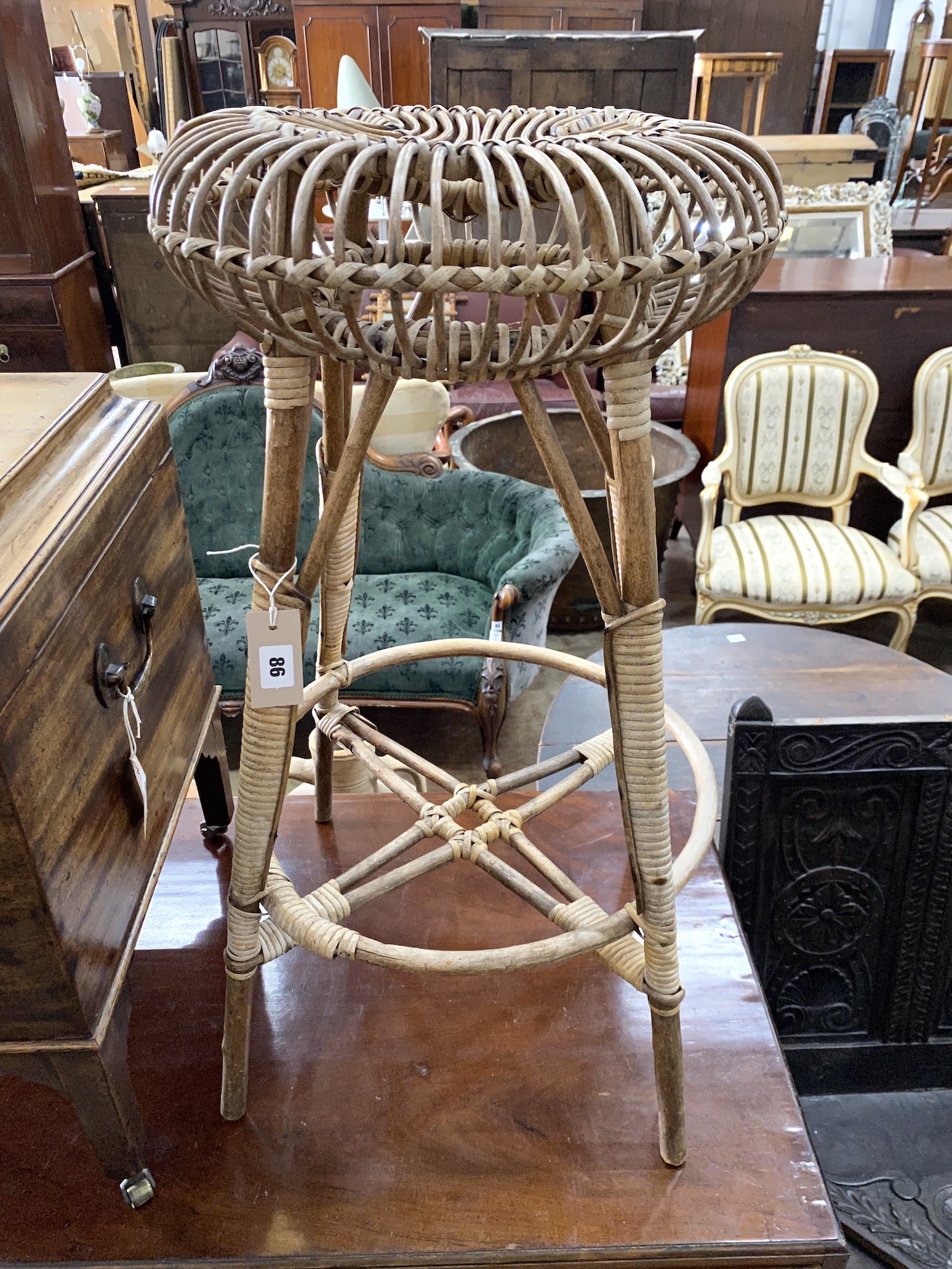 A Franco Albini cane bar stool, height 77cm